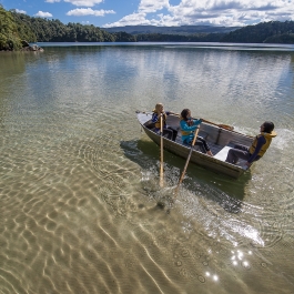 Lake Waikareiti - Girls in a row boat on Lake Waikareiti